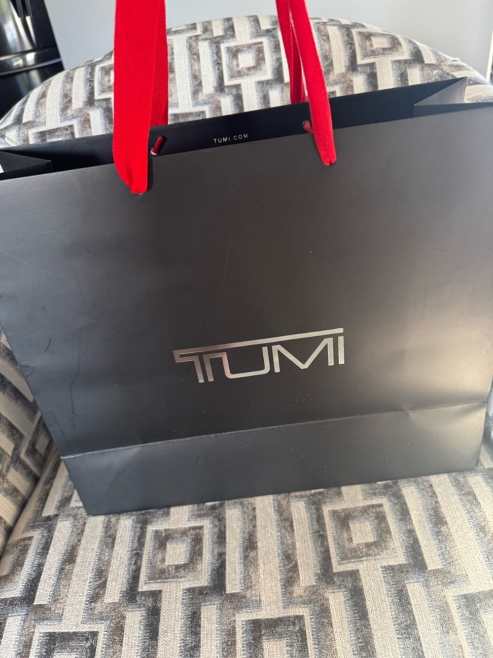 NWOT Tumi Women’s Black Shopping Bag/Gift Bag with Red Ribbon Handles